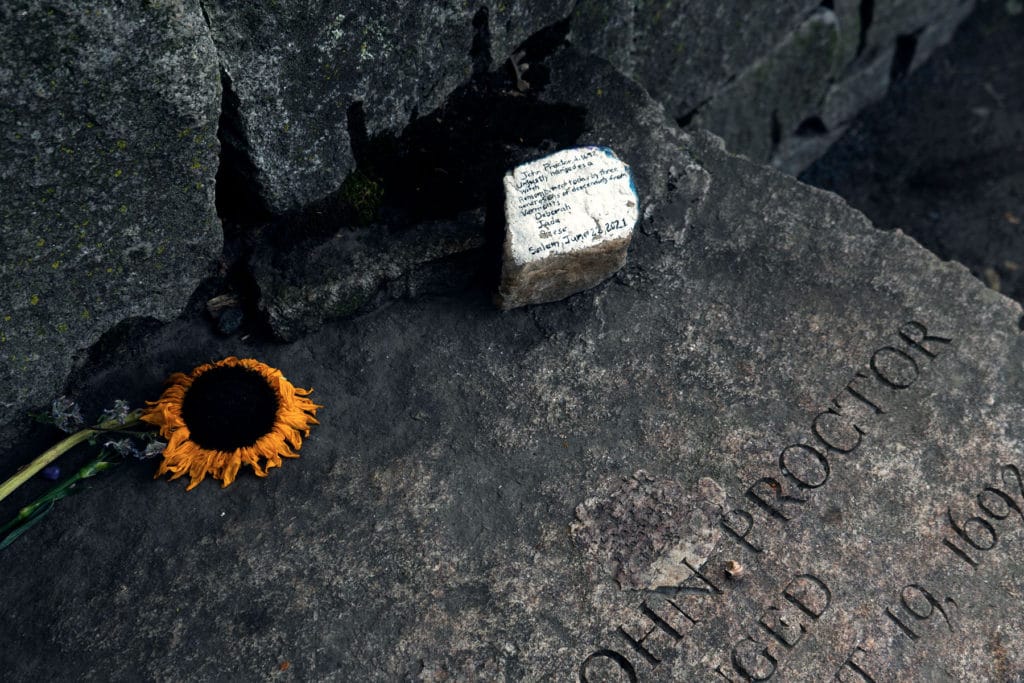 John Proctor grave from the Salem witch trials.  Sunflower and message lay in tribute.  